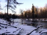Down in the river, ice was forming.